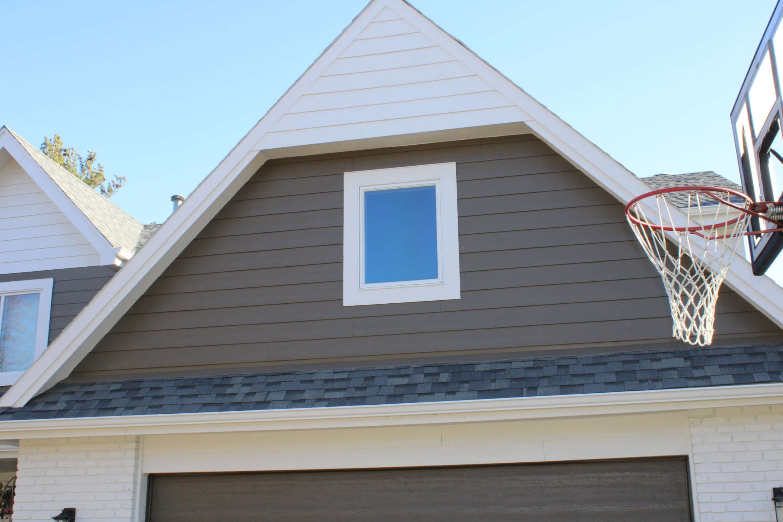 James Hardie siding home with basketball hoop