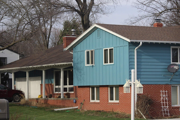 install siding on brick house