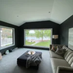 large living room windows overseeing a lake in Nebraska